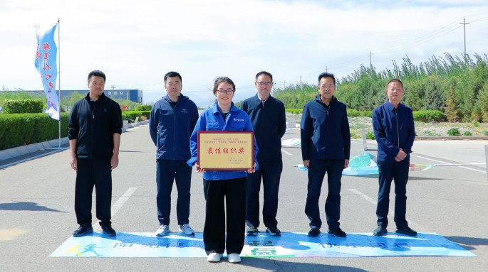 新能源公司組織職工參加武威涼州工業(yè)園區(qū)“匠心向黨 步履不?！甭毠そ〔阶呋顒?dòng)